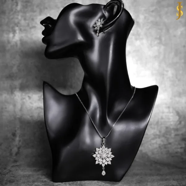 Sanaadhya Rhodium Plated American Diamond Daisy Pendant Set with Chain and Earrings