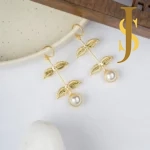 Tanjore Handcrafted Golden Hasli with Pearl Earrings jewellery design