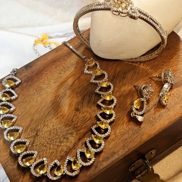 Sanaadhya Rhodium Plated American Diamond Conch Necklace and Bracelet Combo