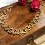 Rhodium Plated American Diamond Conch Necklace and Bracelet Combo set