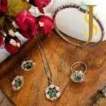 Rhodium Plated American Diamond Mint Green Flower Pendant, Ring and Bracelet Combo design set