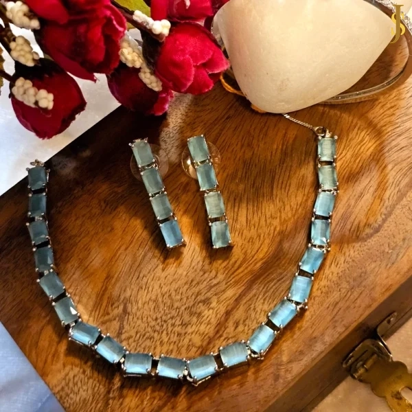 Sanaadhya Rhodium Plated American Diamond Stone Sky Blue Necklace and Bracelet Combo