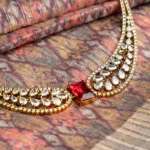 Royal Kundan Crystal Necklace Set with Green, Blue and Ruby Accents